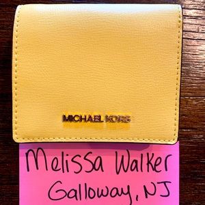 MK Jetset medium travel carryall card case in neon yellow